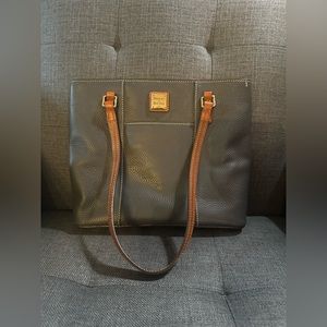 Dooney and Bourke pebble leather purse in grey.